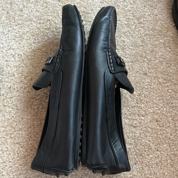 Tod\'s Black Leather Slip-On Loafers with Metal Buckle